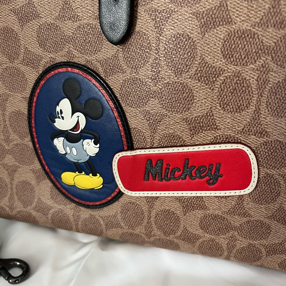 Disney X Coach Charlie Carryall
In Signature Canvas With Patches - Picture 5 of 15